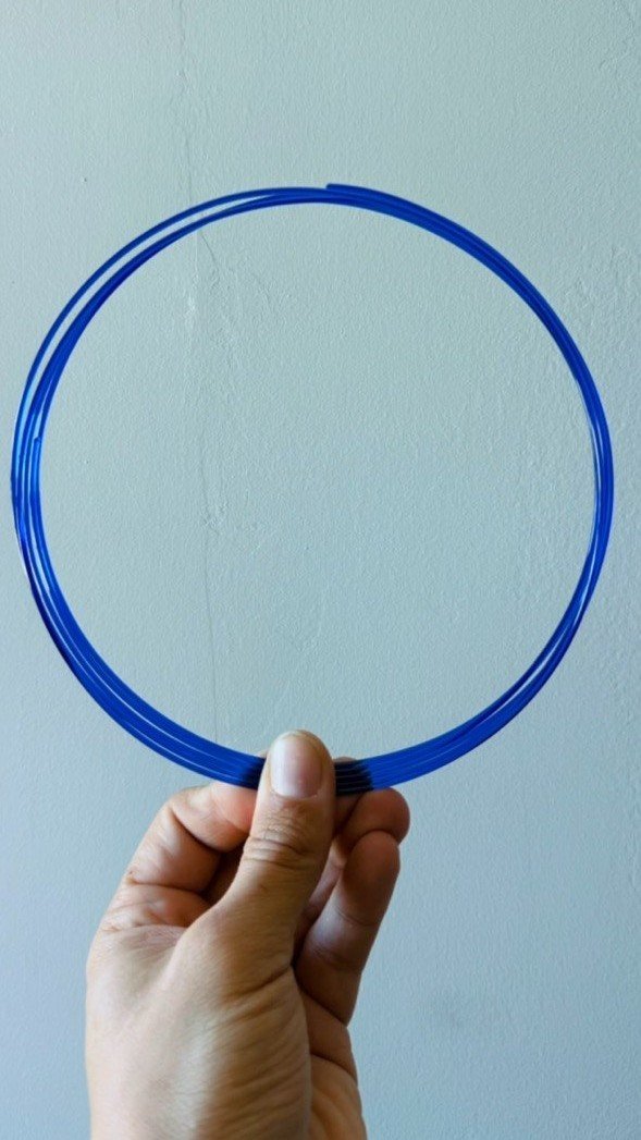 Coiled 1.75 mm filament — the in-house product, ready to print