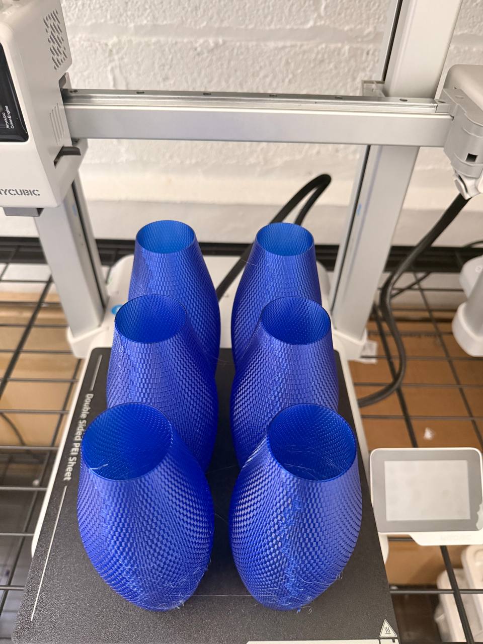 Sapphire ORIGEN vases fresh off the printer bed